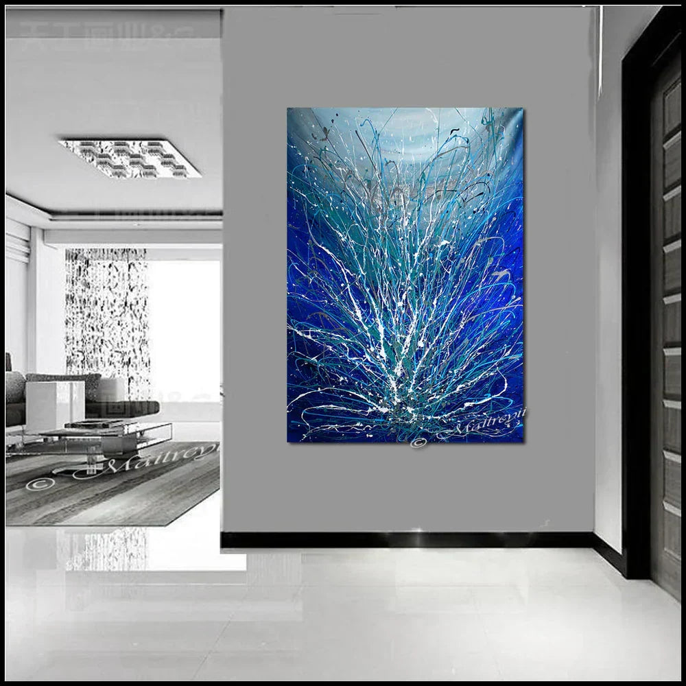 Wall art for living room featuring large modern abstract painting with blue tones.