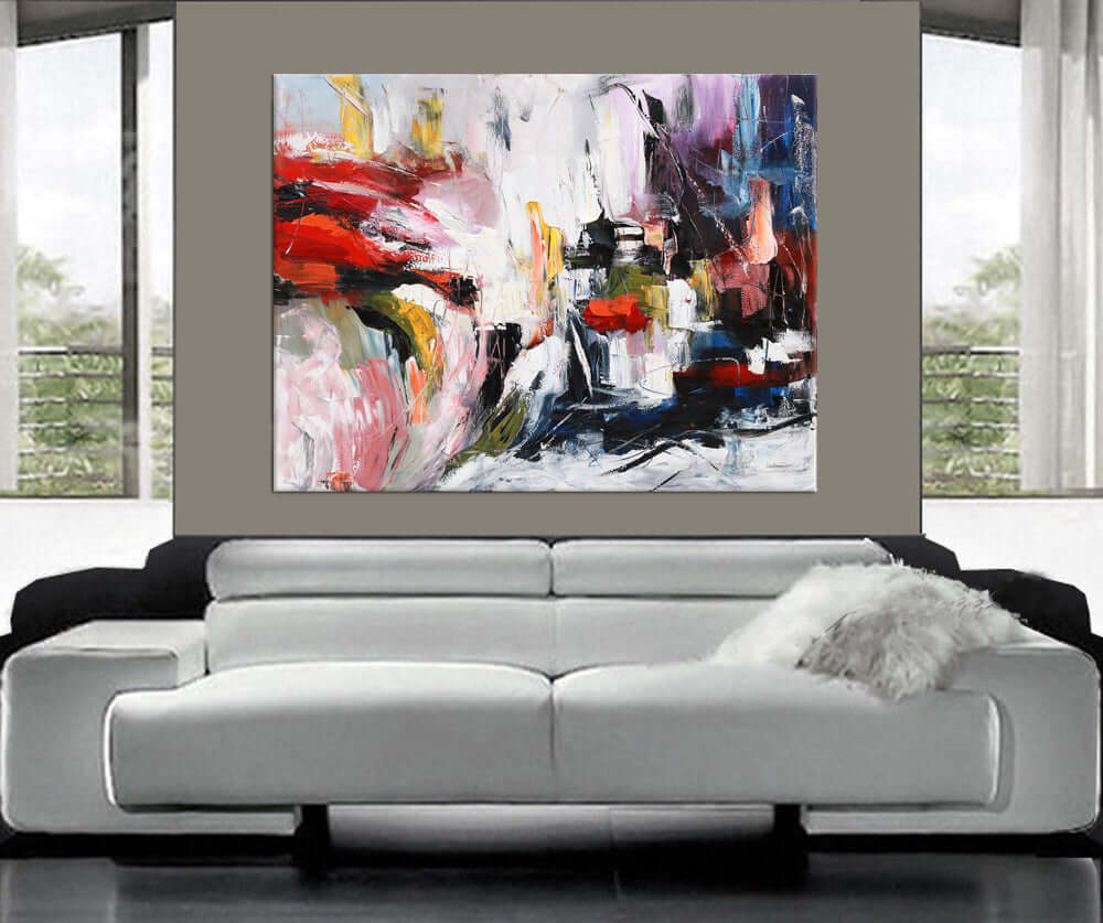 Large Abstract Red and Black Painting displayed in a modern living room setting with white furniture.