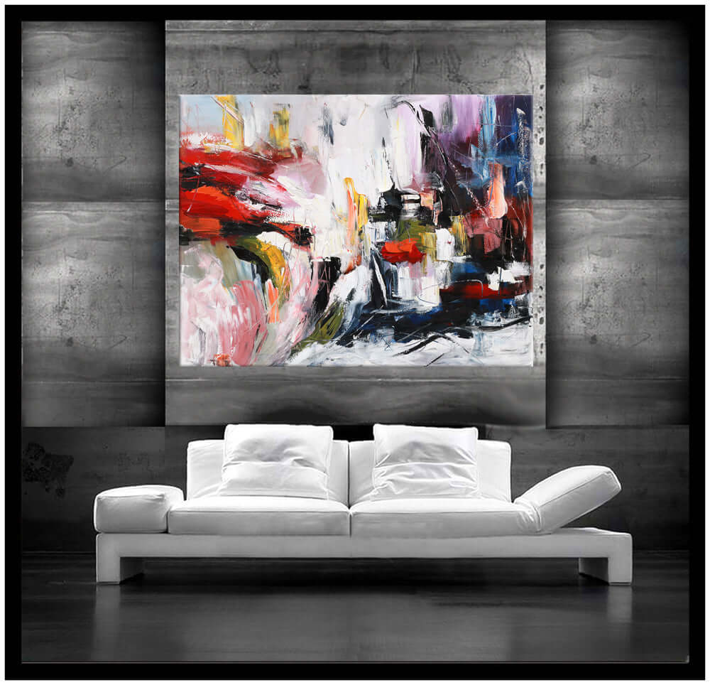 Large Abstract Red and Black Painting displayed in a modern living room with white couch and contemporary decor.