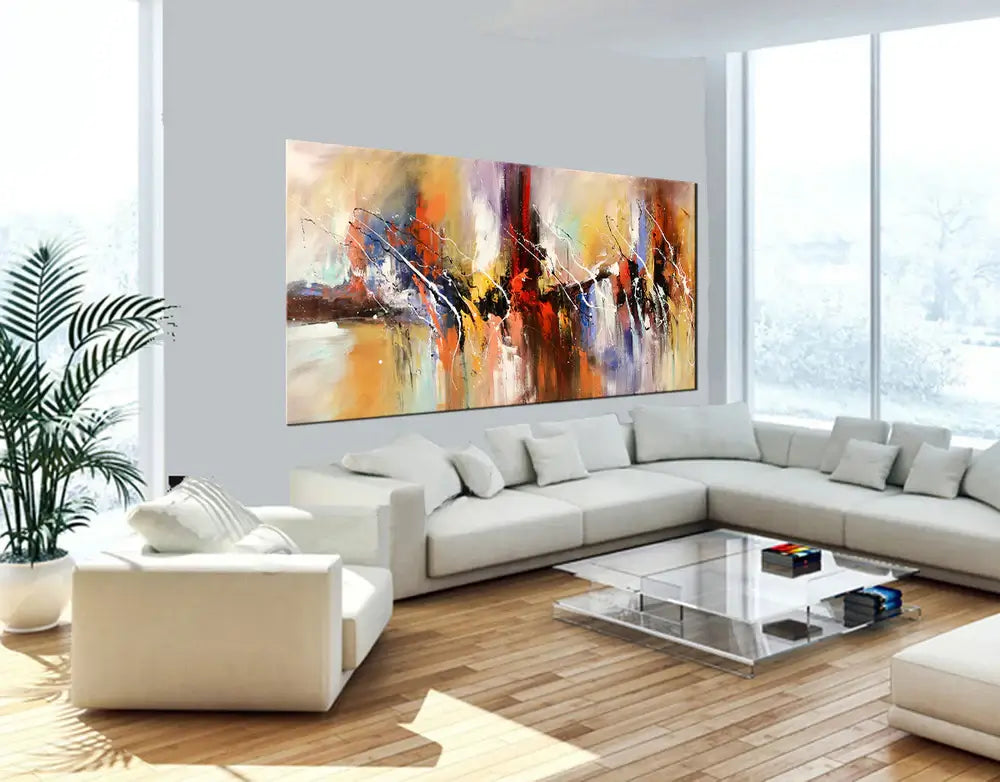 Hand-Painted Abstract Artwork displayed in modern living room with light walls and large windows.