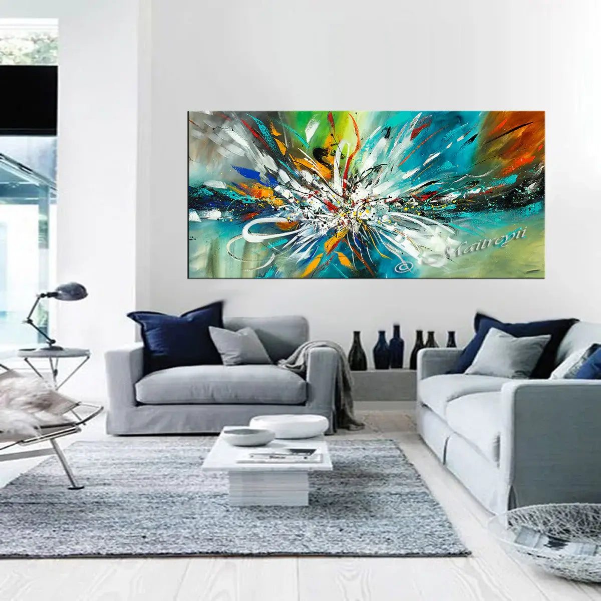 Abstract Modern Art Oil Painting displayed in a modern living room with stylish furniture and a cozy atmosphere.