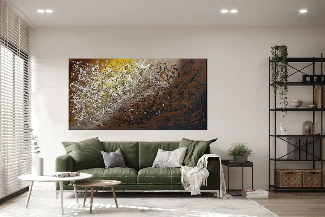 Jackson Pollock style art featuring energetic drip painting in modern living room setting with green sofa.