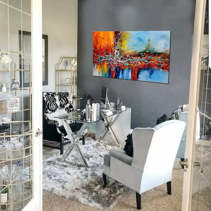 Original Abstract Paintings displayed in a modern office setting with vibrant color and expressive movement.
