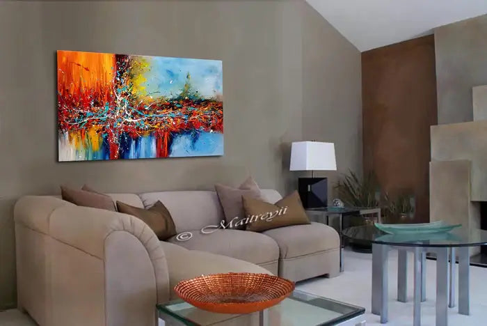 Original Abstract Paintings displayed in a modern living room, showcasing vibrant colors and expressive movement.
