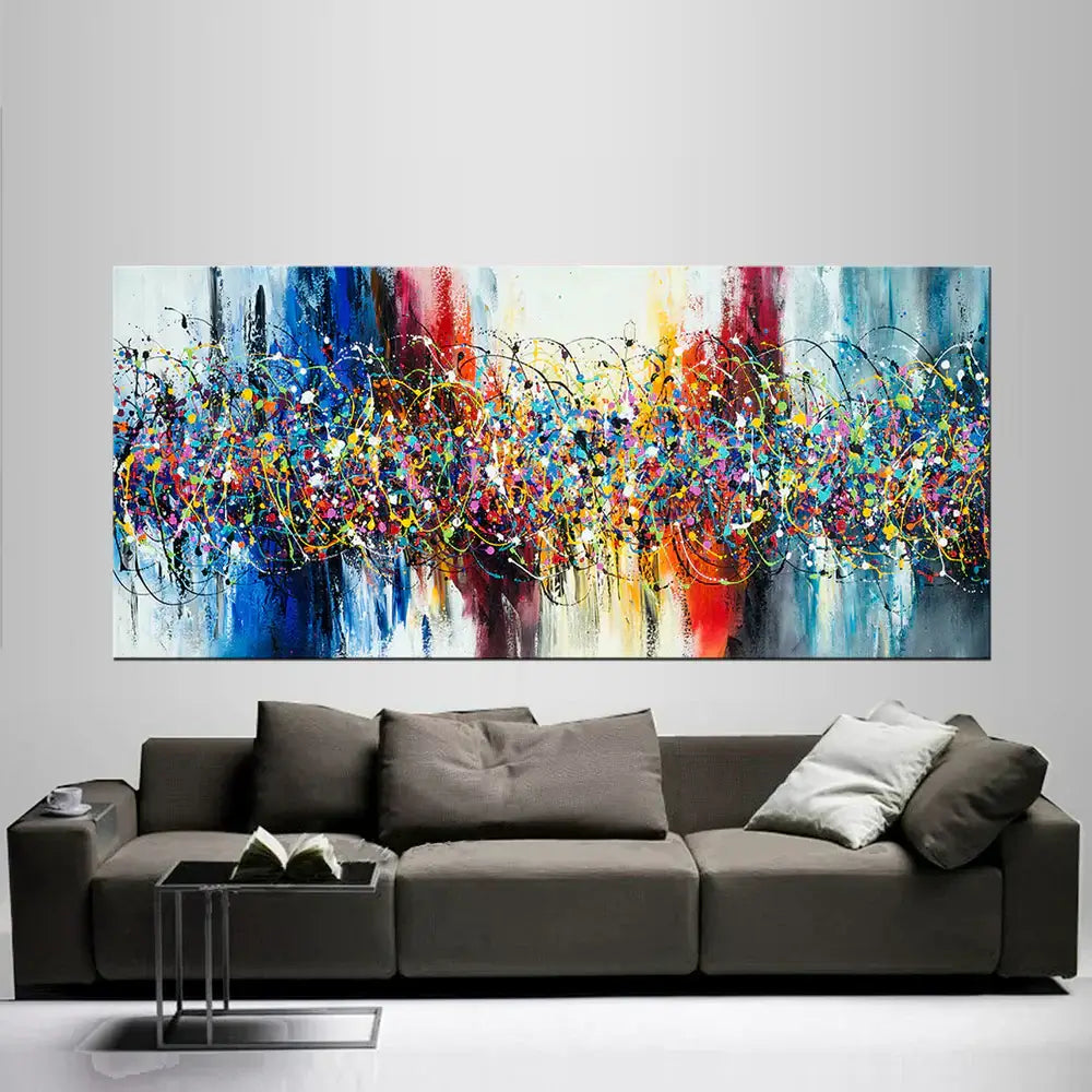 Abstract Angel Paintings displayed above a modern couch, featuring vibrant colors and uplifting design.