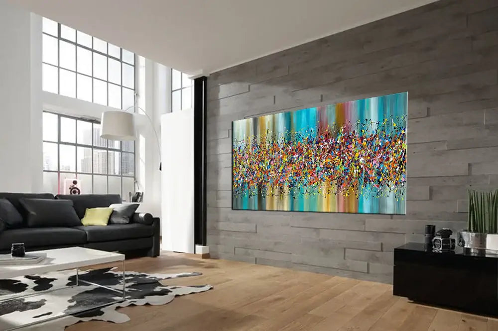 Painting Jackson Pollock style displayed in a modern living room, showcasing vibrant colors and dynamic abstract design.