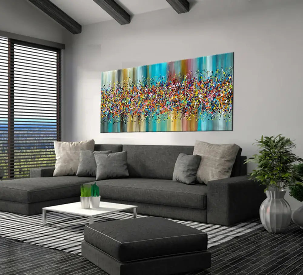 Painting Jackson Pollock Style displayed in a modern living room setting, showcasing vibrant colors and abstract design.