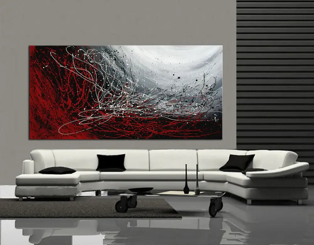 Original Pollock Style Artwork displayed in modern living room with red and black abstract design.