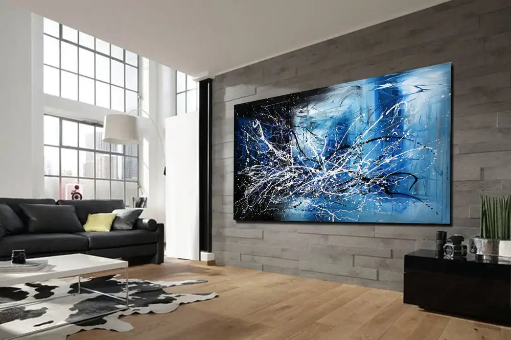 Colorful Abstract Painting displayed in modern living room, featuring vibrant blue hues and dynamic textures.