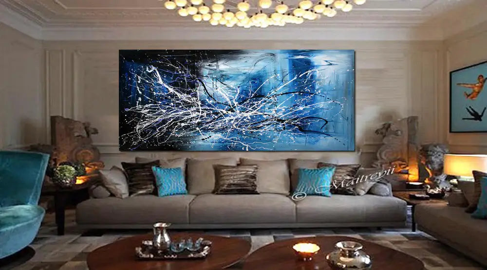 Large Abstract Wall Decor in a modern living room, featuring hand-painted canvas art in blue and white tones.