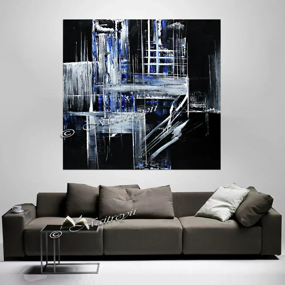 Black and white Wall Art showcasing abstract painting by Maitreyii, enhancing modern living room decor.