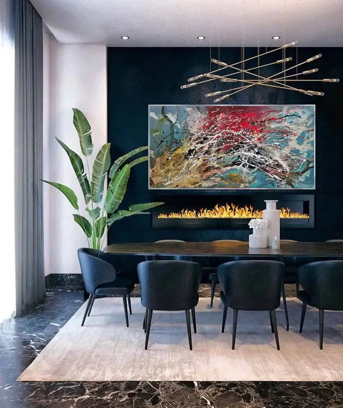 Abstract painting in a modern dining room featuring vibrant colors and sleek decor.