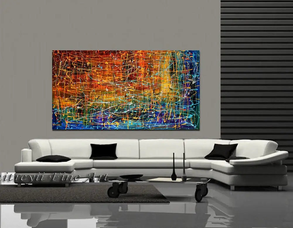 Drip Painting on Canvas - Hand-Painted Abstract Art in a modern living room setting.