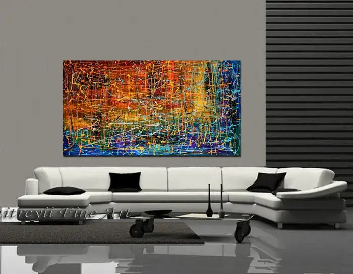 Multicolored Abstract Painting Embracing Fire displayed in a modern living room setting on a large wall.