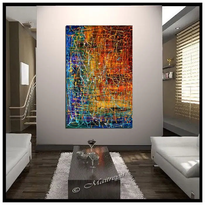 Multicolored Abstract Painting titled Embracing Fire displayed in modern living room interior design.