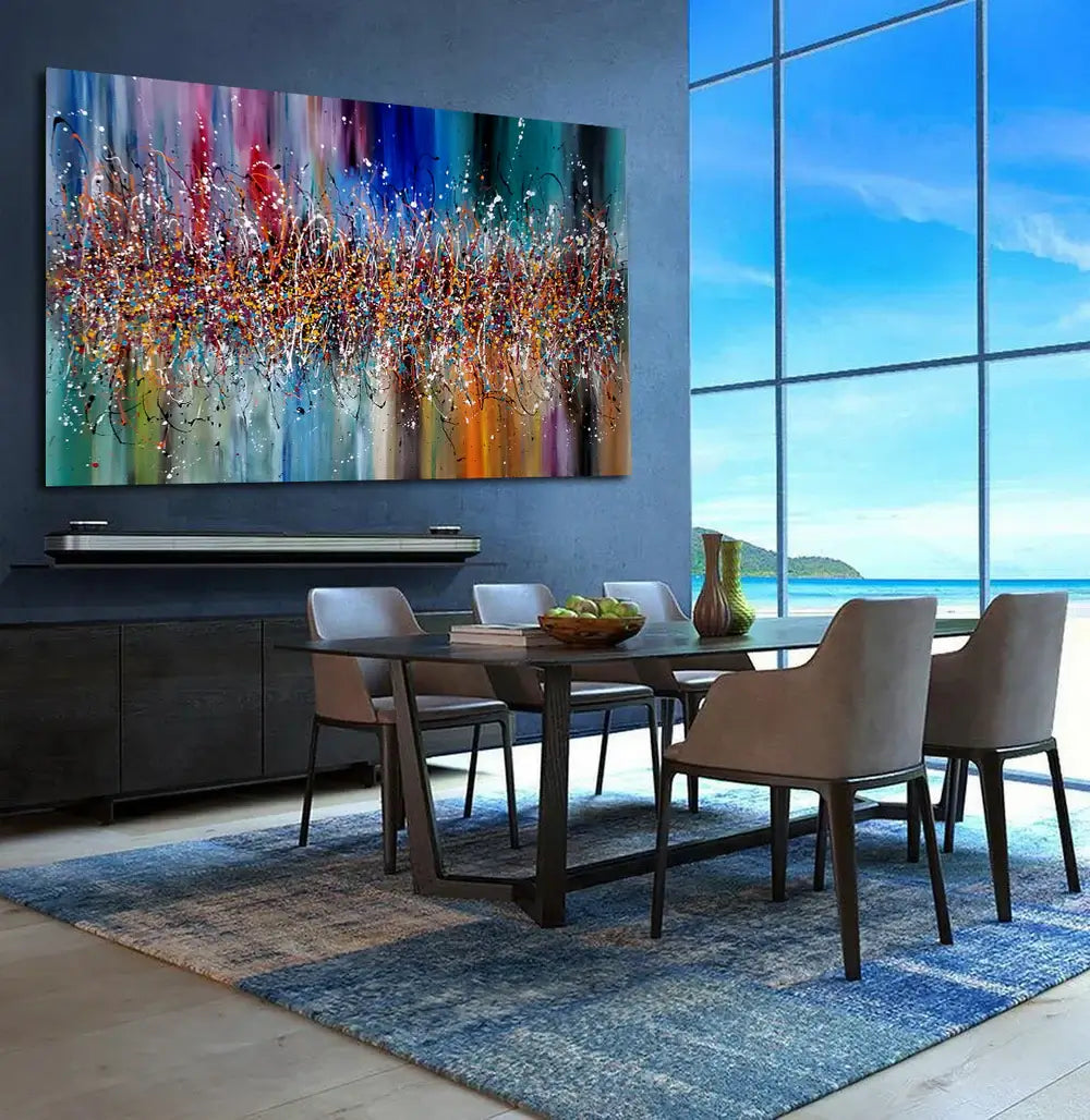 Colourful Abstract Wall Art displayed in a modern dining room with ocean view and elegant decor.