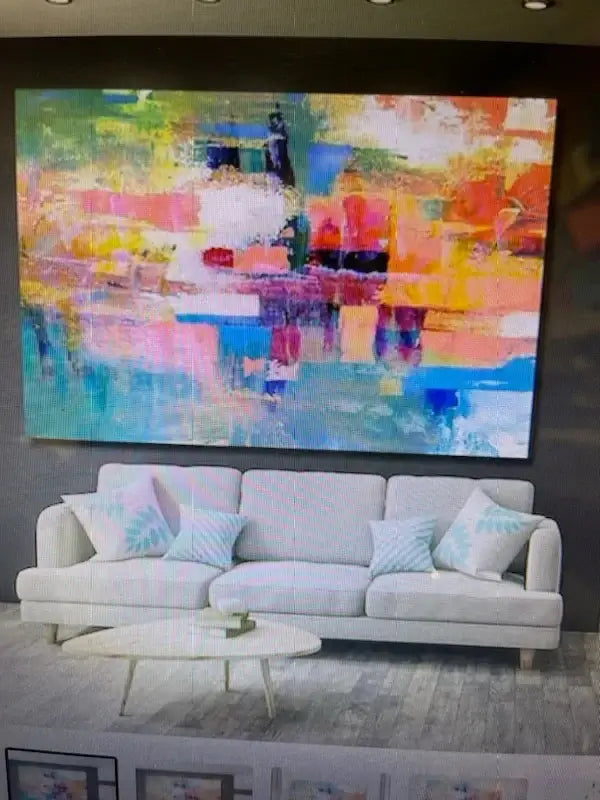 Abstract painting on canvas by Maitreyii, adding vibrant color and modern elegance to a contemporary living space.