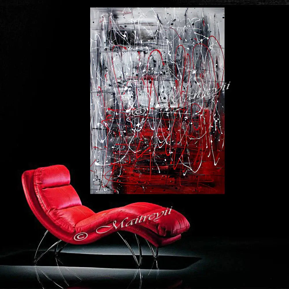 Red Painting Abstract Art by Maitreyii displayed above a modern red chair in a contemporary setting.