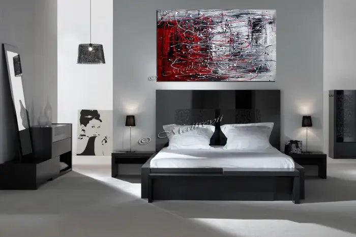 Red Painting Abstract artwork by Maitreyii displayed in a modern bedroom interior, showcasing vibrant red tones and textures.