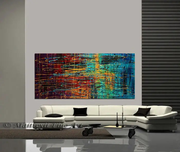Jackson Pollock Style Abstract art large wall art hanging above a modern white sofa in a stylish living room.
