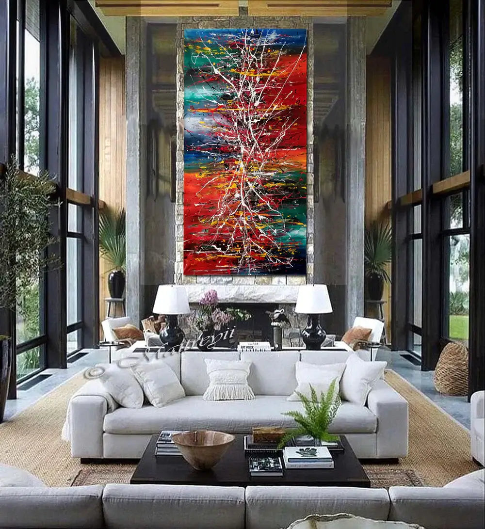 Painting Jackson Pollock style artwork displayed in a modern living room with a comfortable sofa and elegant decor.