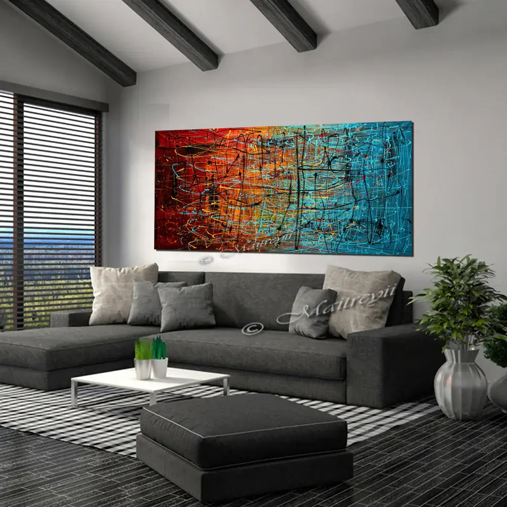 Original Pollock Style Artwork showcased in modern living room, featuring vibrant colors and abstract drip painting by Maitreyii.