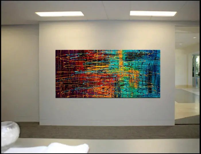 Jackson Pollock style drip painting displayed in a modern interior setting, showcasing vibrant colors and dynamic textures.