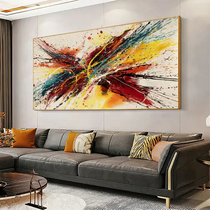 Abstract canvas painting displayed above a stylish sofa in a modern living room, showcasing bold colors and vibrant designs.