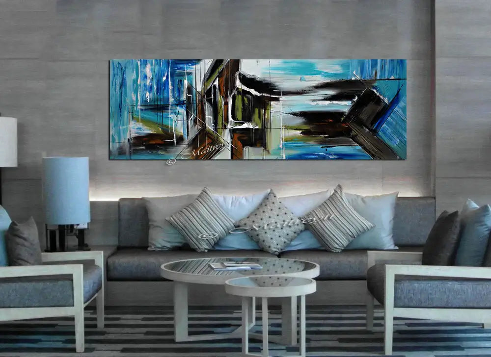 Large Abstract Blue Painting displayed in a modern living room, showcasing calming colors and contemporary decor.
