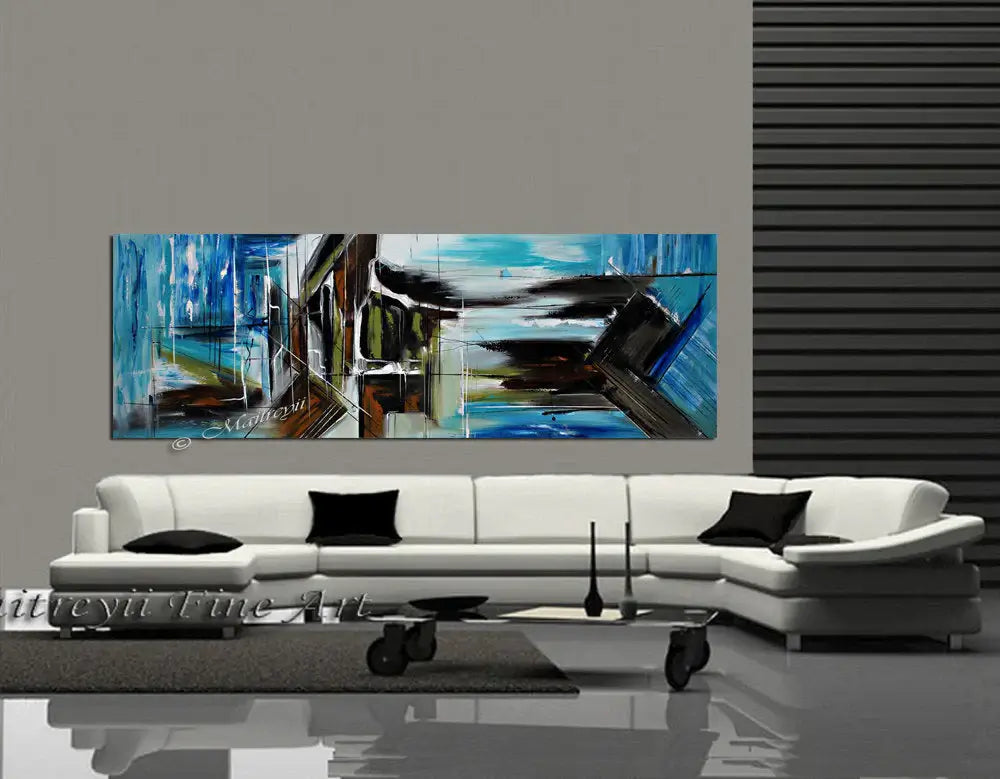 Large Abstract Blue Painting displayed above a modern white sofa in a stylish living room interior design.