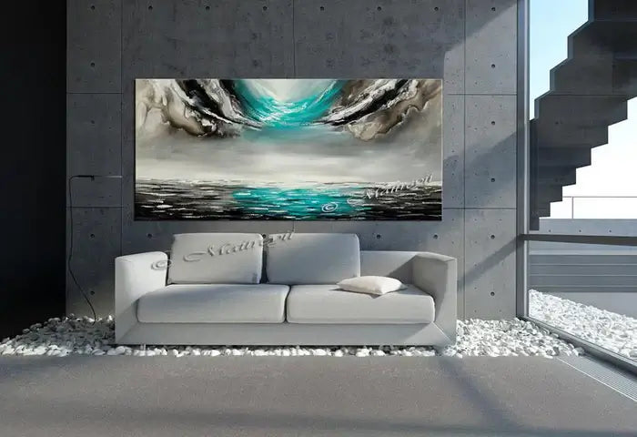 Large Ocean Art Teal Turquoise Paintings displayed above a modern couch in a contemporary living space.