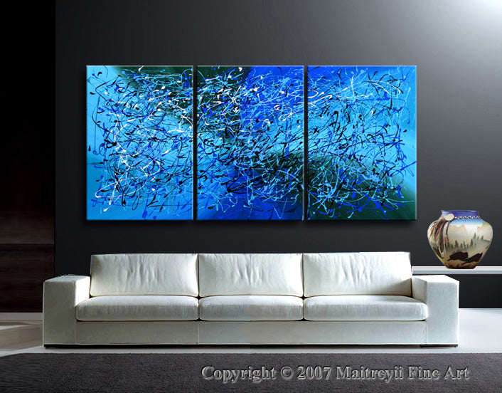Abstract Canvas Wall Art – Extra Large Modern Painting displayed above a white sofa in a cozy living room setting.