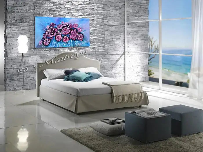 Flowers Painting featuring vibrant pink roses on canvas above a modern bedroom decor with ocean view.