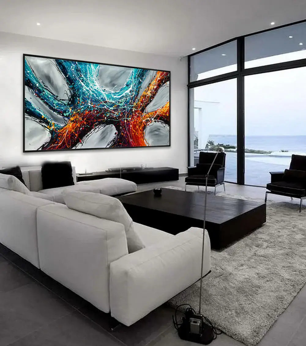 Original Abstract Artwork showcased in a modern living room with ocean view, featuring vibrant colors and unique textures.