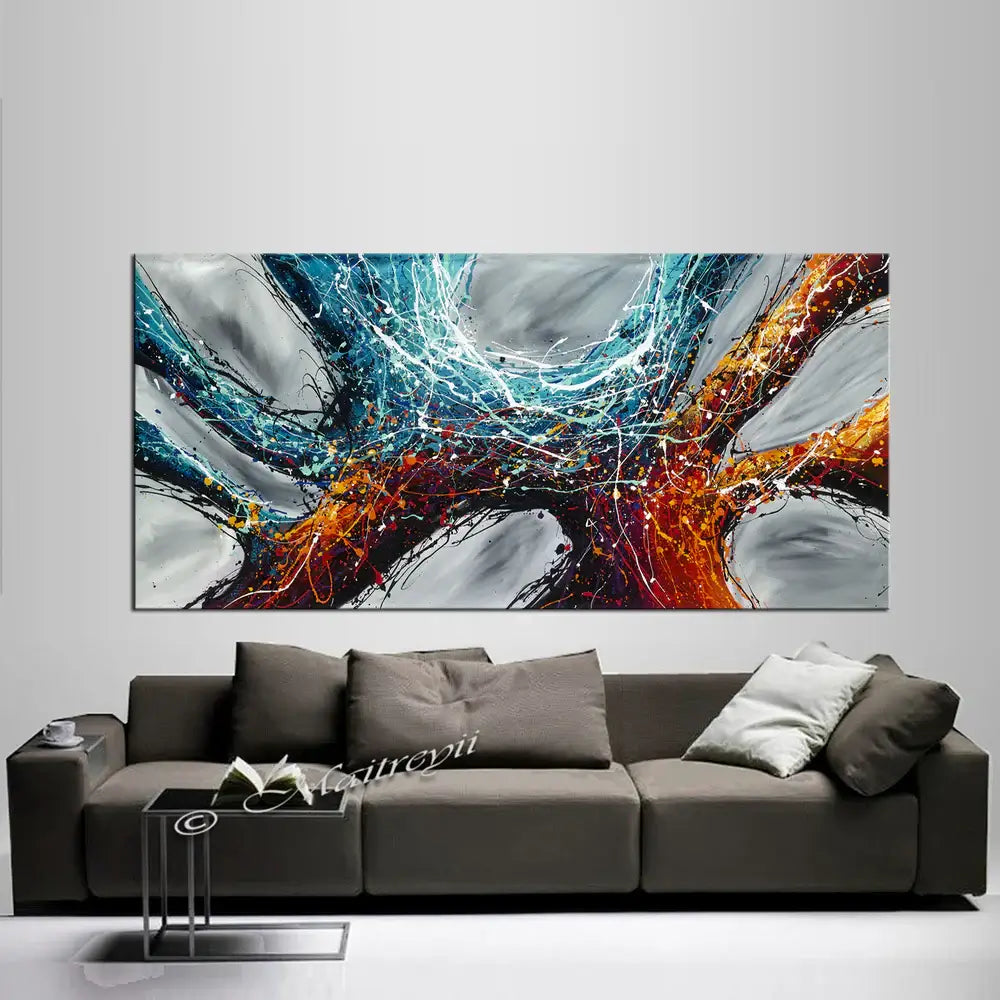 Original Abstract Artwork featuring vibrant colors and dynamic textures displayed above a modern sofa.