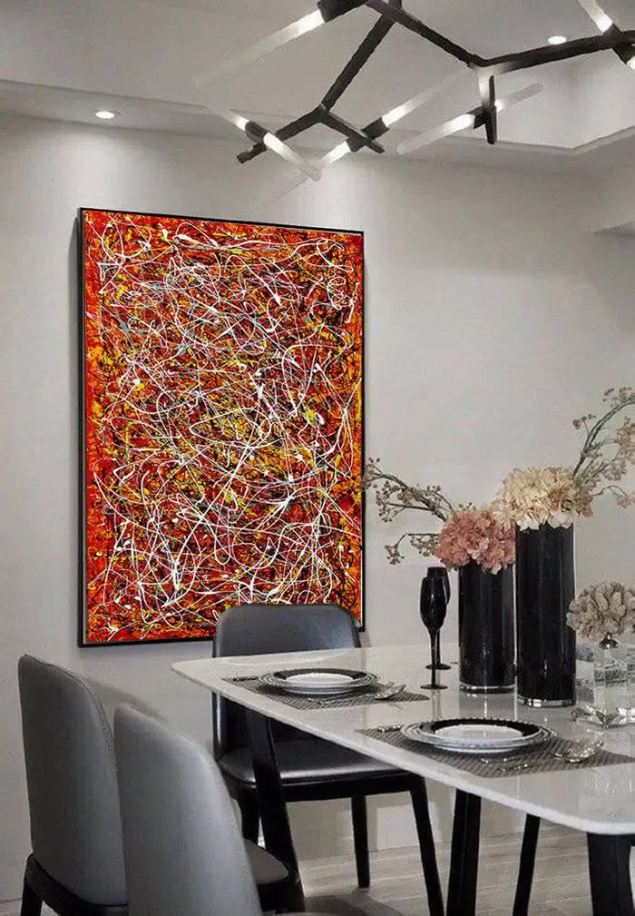 Red Painting Jackson Pollock Style art displayed in a modern dining room, featuring vibrant red tones and expressive textures.