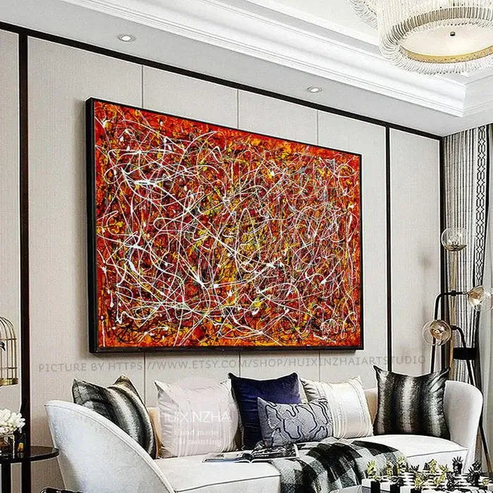 Red Painting Jackson Pollock Style artwork in a modern living room, showcasing vibrant red tones and abstract textures.