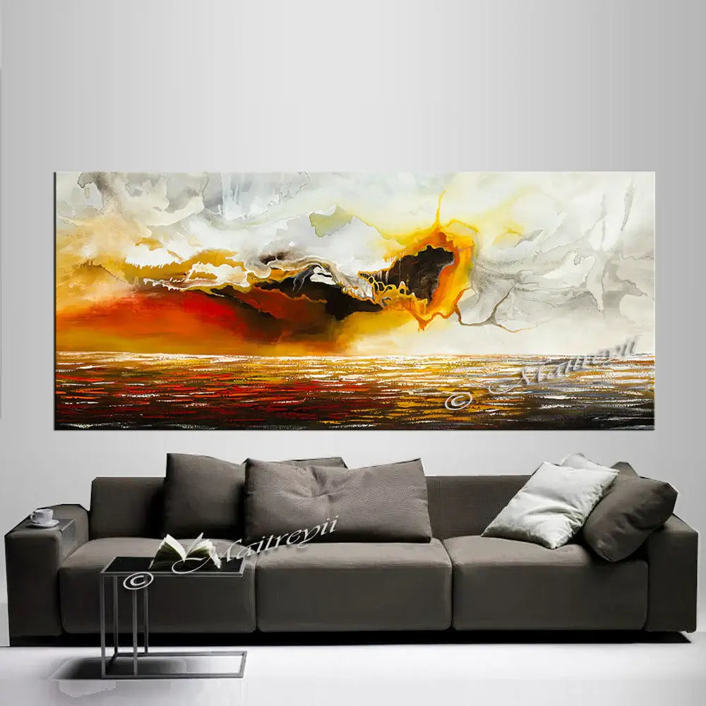 Large Ocean Art Oil Painting featuring vibrant seascape in warm tones above modern gray couch.