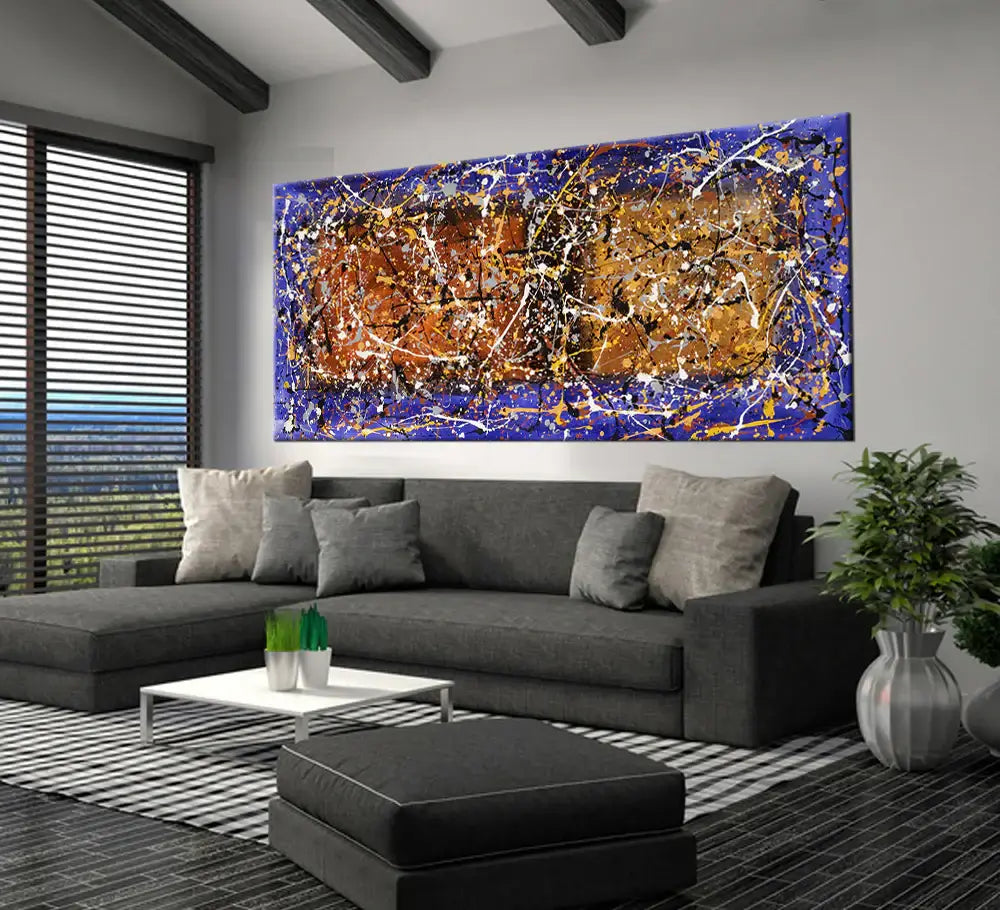 Wall Art Jackson Pollock – Abstract drip painting displayed above a modern sofa in a stylish living room.