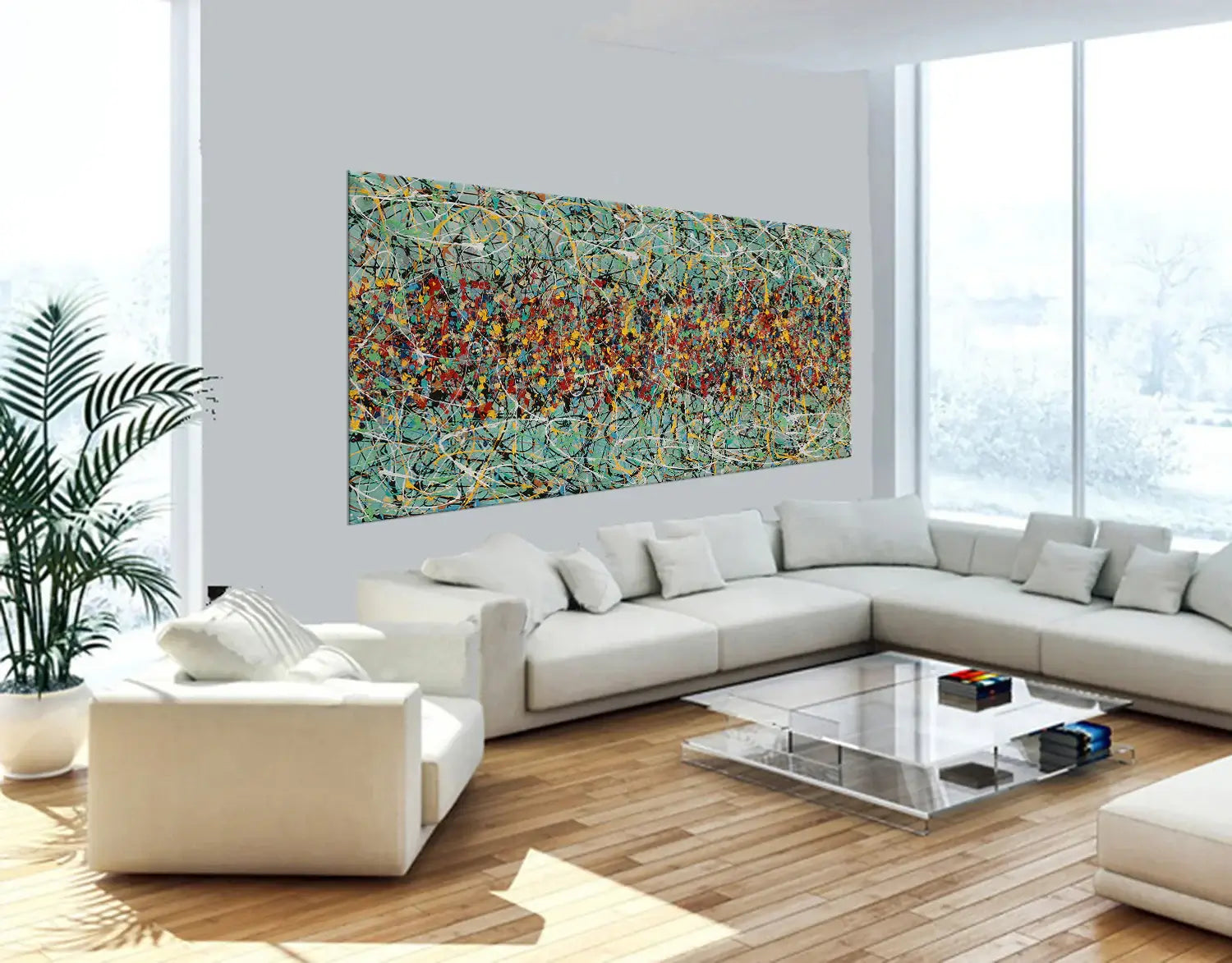 Drip painting on canvas displayed in a modern living room, showcasing vibrant colors and dynamic patterns.