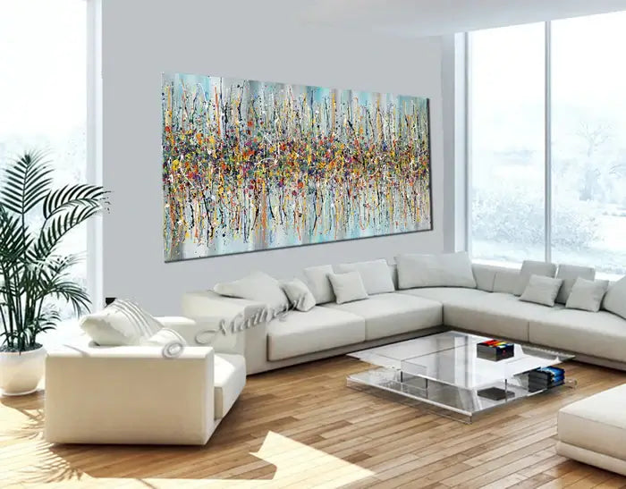 Jackson Pollock canvas art displayed in a modern living room, showcasing bold and colorful abstract painting.
