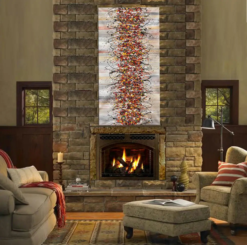 Jackson Pollock Style Painting featured in a modern living room above a stone fireplace, showcasing vibrant drip art on canvas.