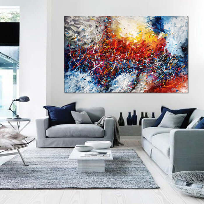 Abstract Paintings on canvas, modern wall art, vibrant colors enhancing a stylish living room.