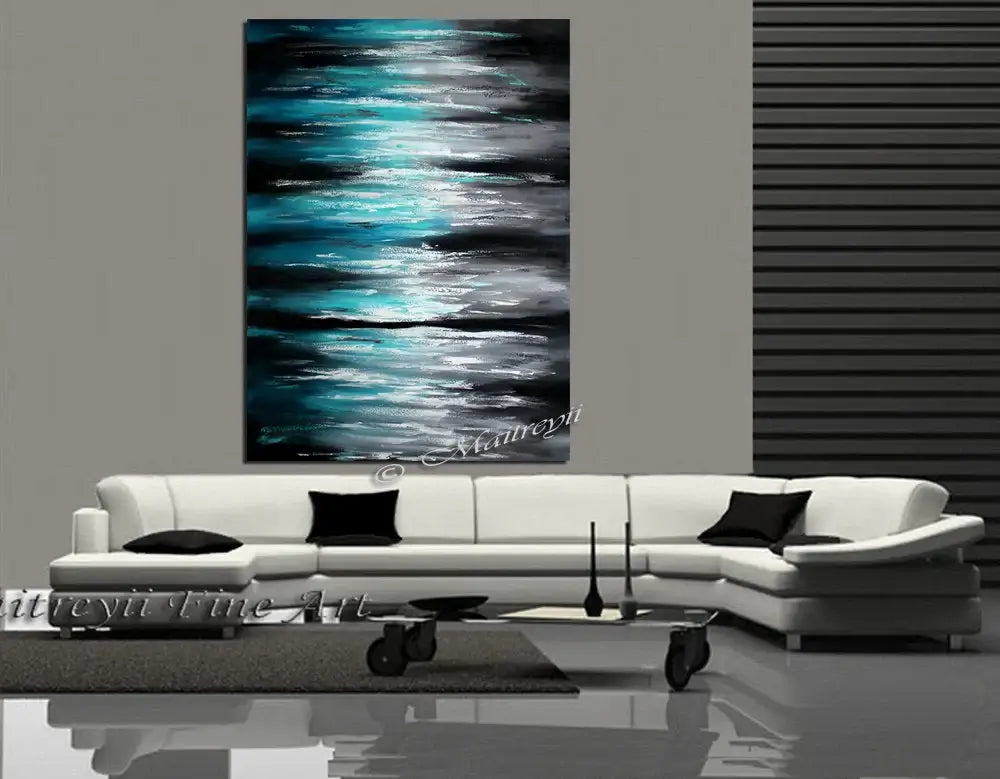 Ocean Modern Wall Art Seascape Painting hanging above a modern white sofa in a stylish interior.