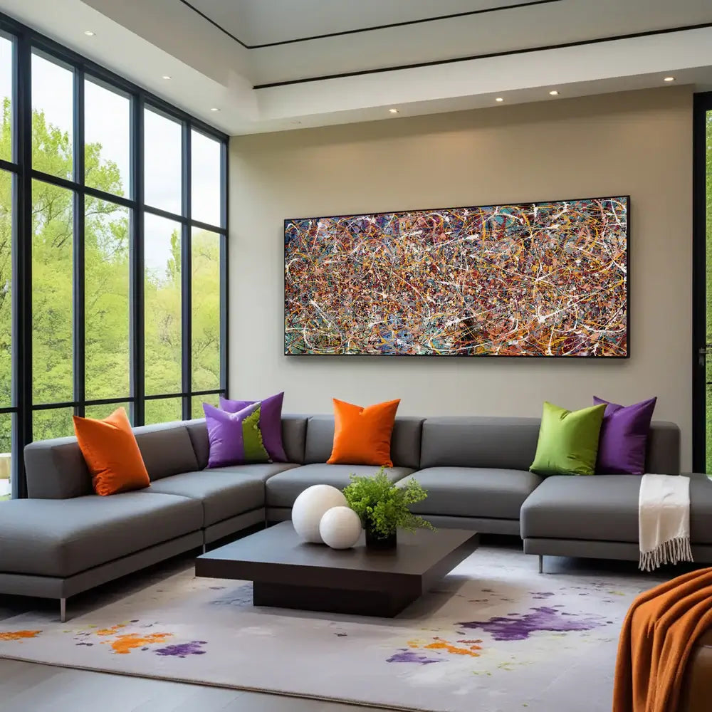 Minimalist Abstract Art displayed in a modern living room with colorful cushions and large windows.