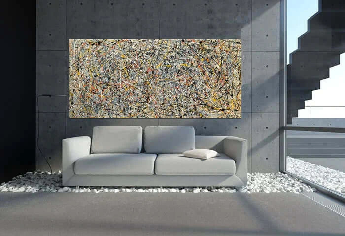 Abstract modern canvas art on wall above a chic sofa in a contemporary office setting.