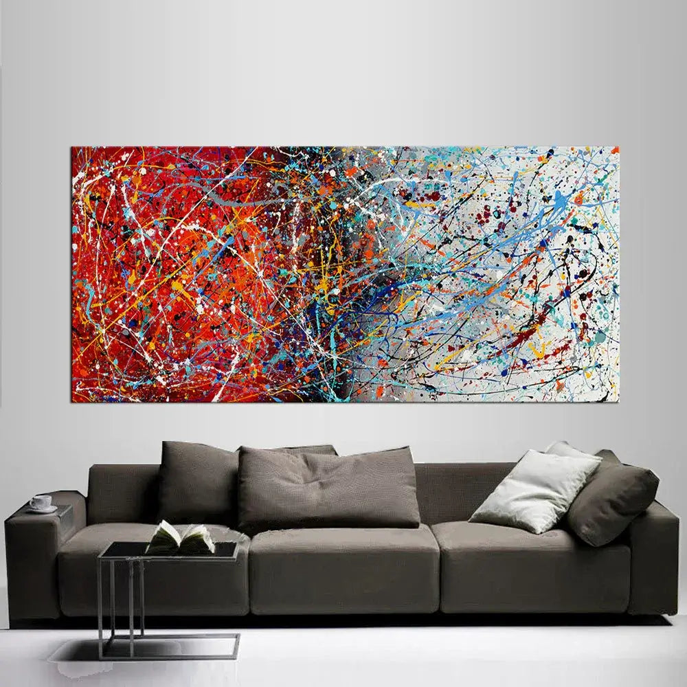 Modern abstract wall decor with vibrant colors, hand-painted canvas above a stylish gray sofa.