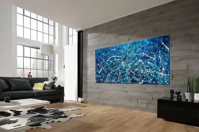 Abstract hand-painted art piece in blue tones, enhancing modern dining room decor.