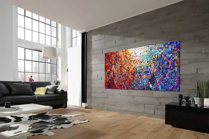 Textured Abstract Art featuring vibrant colors in a modern living room setting, showcasing Jackson Pollock style.