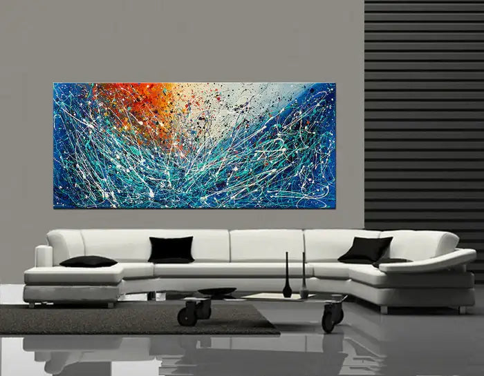 Geometric abstract art piece in blue and orange, enhancing modern living room decor with vibrant hand-painted canvas.